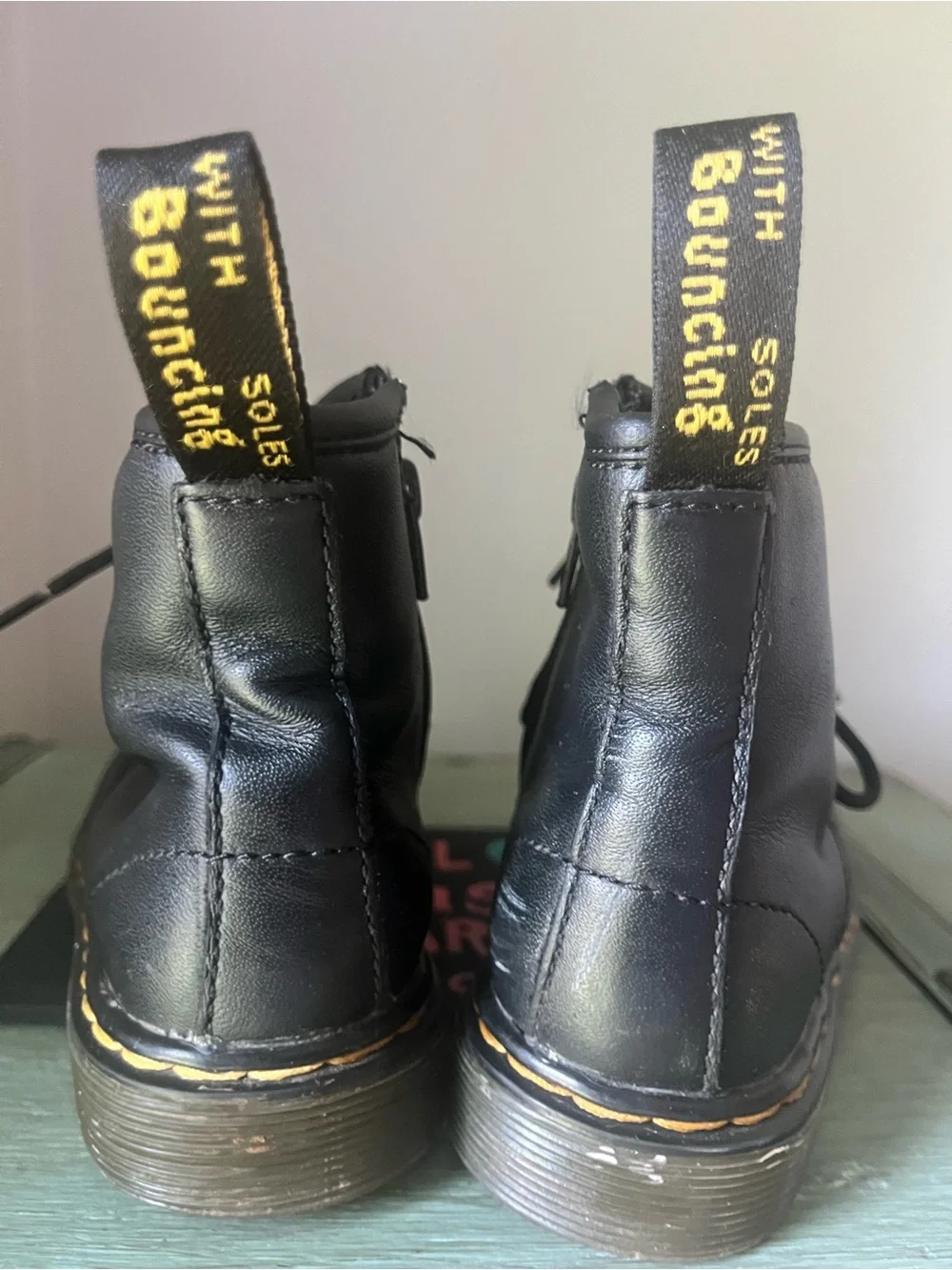 Dr. Martens Junior Kids Black Leather Lace-Up Boots with Yellow Stitching